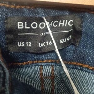 Brand new Bloomchic Size  12 Stretch Jeans.Two Pairs For 35